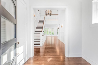 Welcome to 166 Ferry Rd, a luxurious black and white batten - photo 2
