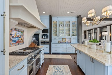 Nestled along the coveted waterfront on Lighthouse Drive in - photo 11