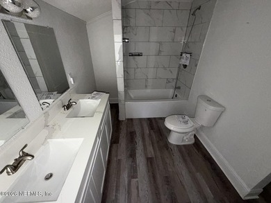 This previously renovated 3 bedroom, 2 bath home is in need of - photo 11