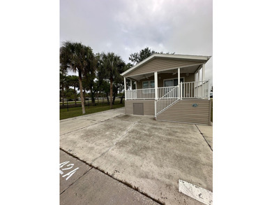 Fully Remodeled 2BR/2BA Corner Lot with Water Views - 55+ - photo 2
