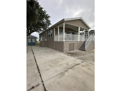 Fully Remodeled 2BR/2BA Corner Lot with Water Views - 55+ - photo 3