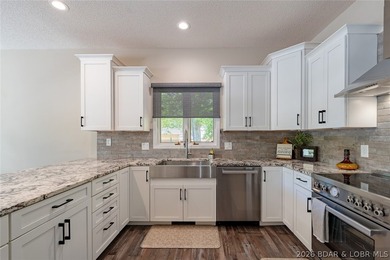 Newly updated lakefront home in Four Seasons with Brand New Roof - photo 16