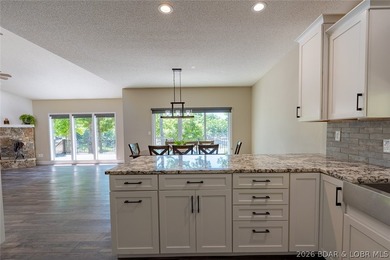 Newly updated lakefront home in Four Seasons with Brand New Roof - photo 17