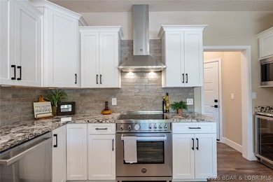 Newly updated lakefront home in Four Seasons with Brand New Roof - photo 18