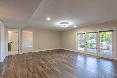 Newly updated lakefront home in Four Seasons with Brand New Roof - photo 32