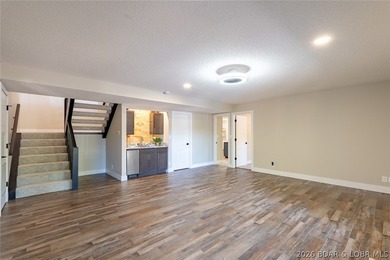 Newly updated lakefront home in Four Seasons with Brand New Roof - photo 33