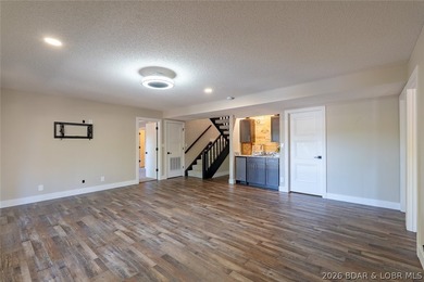 Newly updated lakefront home in Four Seasons with Brand New Roof - photo 35