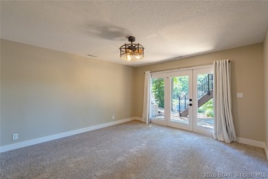 Newly updated lakefront home in Four Seasons with Brand New Roof - photo 39