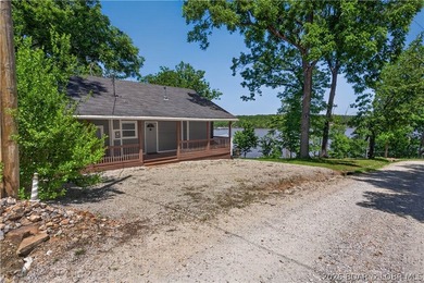 Take a look at this beautiful 4-bedroom, 2-bath home at the Lake - photo 1