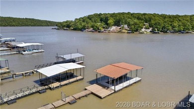 Take a look at this beautiful 4-bedroom, 2-bath home at the Lake - photo 3