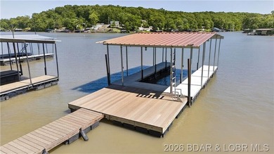 Take a look at this beautiful 4-bedroom, 2-bath home at the Lake - photo 4