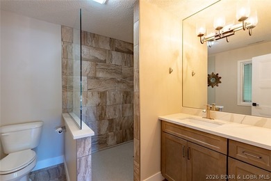Newly updated lakefront home in Four Seasons with Brand New Roof - photo 48