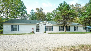 Welcome to your lakefront retreat! This super cute, updated 4 - photo 1
