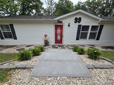 Welcome to your lakefront retreat! This super cute, updated 4 - photo 2