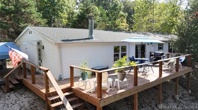 Welcome to your lakefront retreat! This super cute, updated 4 - photo 3