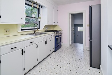 This charming duplex sits on a large lot with a privacy fenced - photo 12