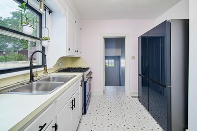 This charming duplex sits on a large lot with a privacy fenced - photo 13