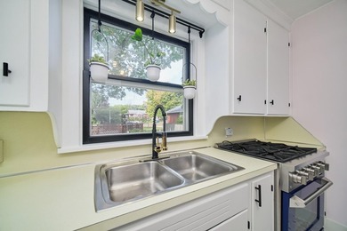 This charming duplex sits on a large lot with a privacy fenced - photo 14