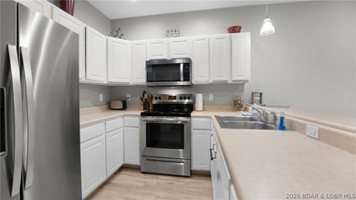 Located in the heart of Osage Beach on the Grand Glaize Arm at - photo 4