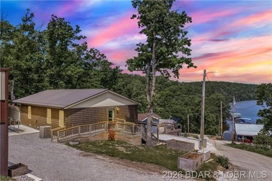 Lake-view property featuring a main residence(28251 Shore Rd) - photo 2