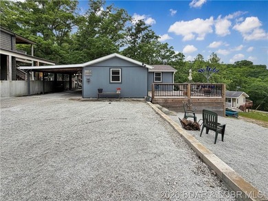 Lake-view property featuring a main residence(28251 Shore Rd) - photo 7