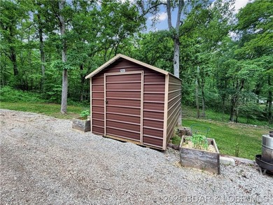Lake-view property featuring a main residence(28251 Shore Rd) - photo 9