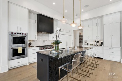 This fabulous GOLD FORTIFIED home is located on Old River with - photo 11