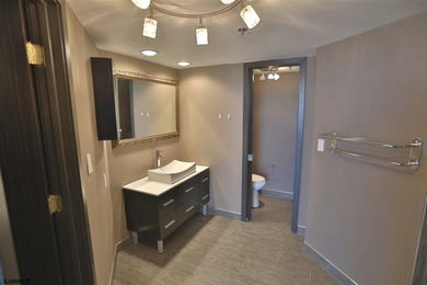 STUNNING!! One bedroom, 1.5 bath unit at the ENCLAVEPLETELY - photo 14