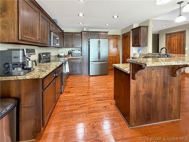 Experience lakefront living in this well-appointed 3-bedroom - photo 3