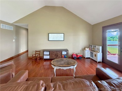 Experience lakefront living in this well-appointed 3-bedroom - photo 4