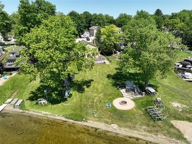 Perfectly positioned along the soft, sandy shoreline of - photo 25