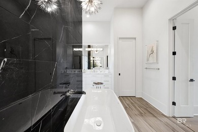 This fabulous GOLD FORTIFIED home is located on Old River with - photo 29