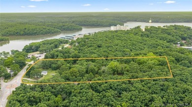 7.8 +/- wooded acres in the heart of Osage Beach with city sewer - photo 4