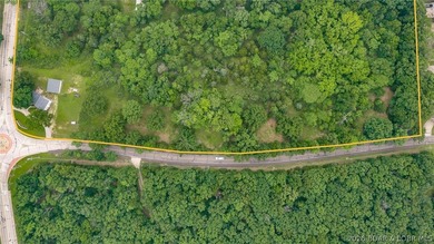 7.8 +/- wooded acres in the heart of Osage Beach with city sewer - photo 6
