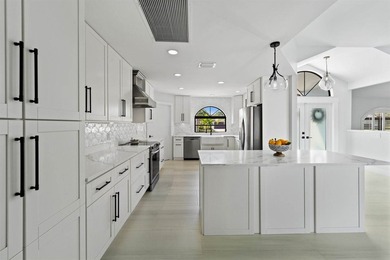 Beautifully renovated waterfront home in Beau Rivage with ocean - photo 11