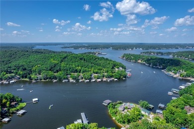 Welcome to this 3-bedroom, 2-bathroom home in Sunrise Beach, MO - photo 6