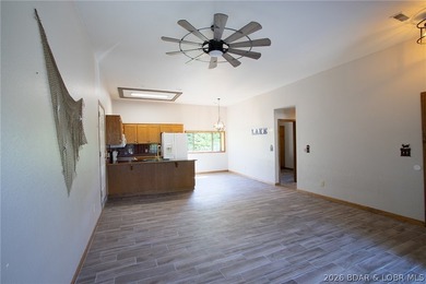 Welcome to this 3-bedroom, 2-bathroom home in Sunrise Beach, MO - photo 10