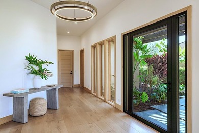 Set behind the gates of Wailea Golf Estates, this like-new - photo 19
