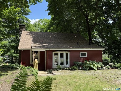 Luna Sloop Cottage. Tucked into the hillside, this enchanting 2 - photo 1