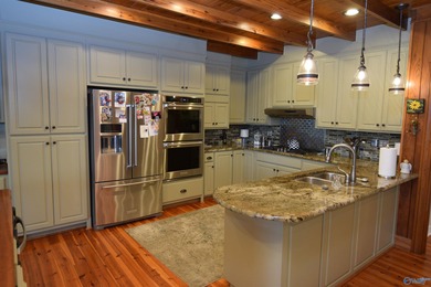 Stunning Remodeled Main Channel Waterfront Home boasting 209+/- - photo 7