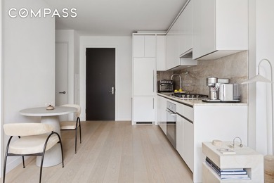 Residence 617 at 450 Washington Street is a sun-filled - photo 3