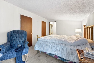 Tucked away on 2.33 lakefront acres, 33400 Kings Way Road offers - photo 6