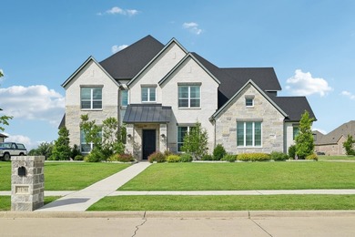 Don't miss one of the larger homes in The Bridges! This - photo 1