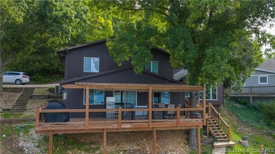 Located at the 43 MM, this lakefront property offers 75' of - photo 1