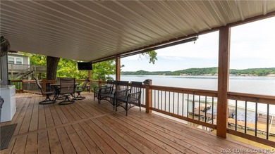 Located at the 43 MM, this lakefront property offers 75' of - photo 2