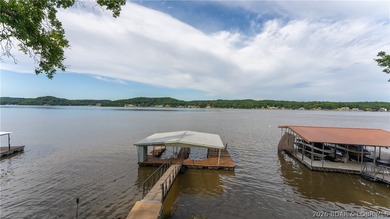 Located at the 43 MM, this lakefront property offers 75' of - photo 3