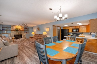 Welcome to lake living at its best! This must-see 3-bedroom - photo 7