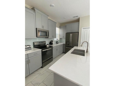 Welcome to this stunning 5-bedroom, 5-bathroom home, where - photo 10