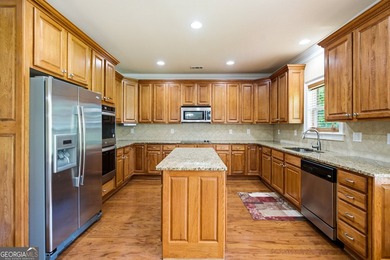Step into luxury and comfort with this magnificent all-brick - photo 6