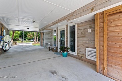 Set on one of Wrightsville Beach's most coveted streets in the - photo 5